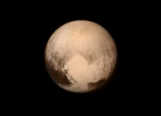 Pluto: A Tiny World in the Vastness of Space