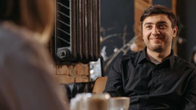 Body Language Signs Someone Is Attracted to You — Featured image