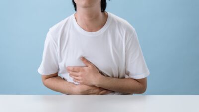 Illustration of Stomach Cancer Symptoms You Might Be Brushing Off Right Now
